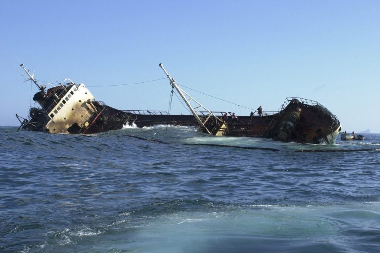 Visual of Sinking Ship In ocean sinking ship, taking on water
